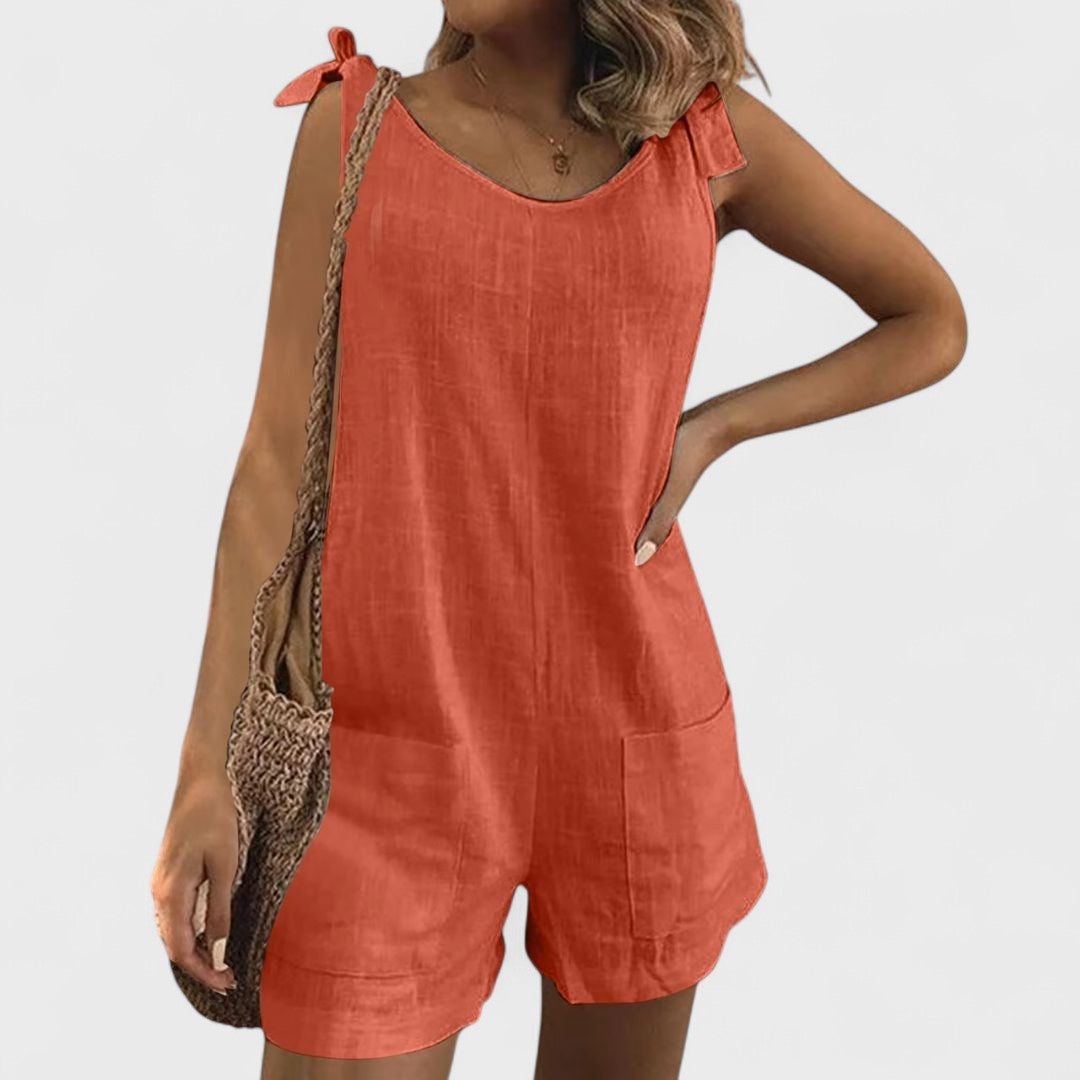 Maia - Tuta corta con tasche sulle spalle e lacci