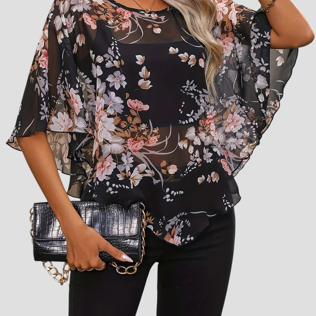 Chiara – Blusa Floreale Asimmetrica con Girocollo Elegante